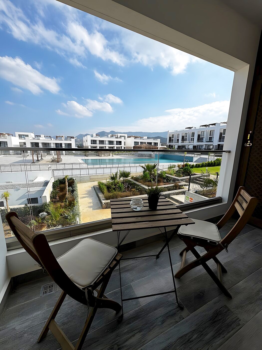 Seating on the terrace above the resort pool